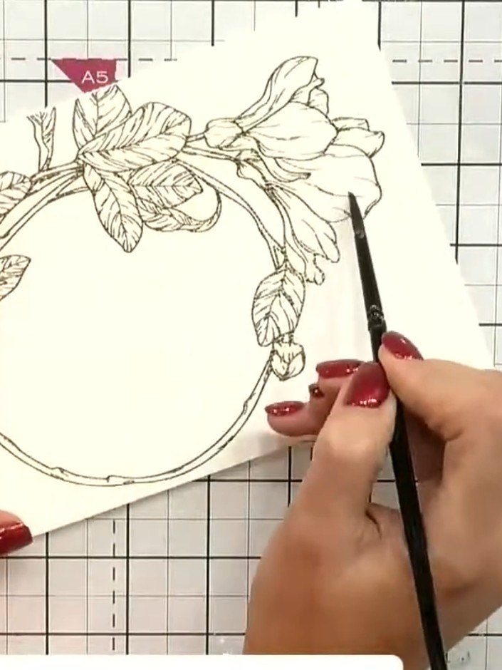 Step 3: Swipe your ink pad onto a craft mat or palette to pick up colour on your brush. Choose your desired watercolou