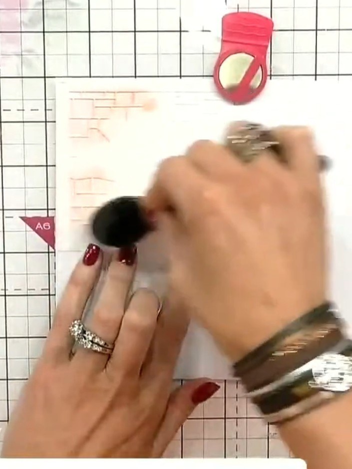 Step 3: Apply ink through the first numbered stencil using a blending brush or sponge. Use the red ink pad to colour t