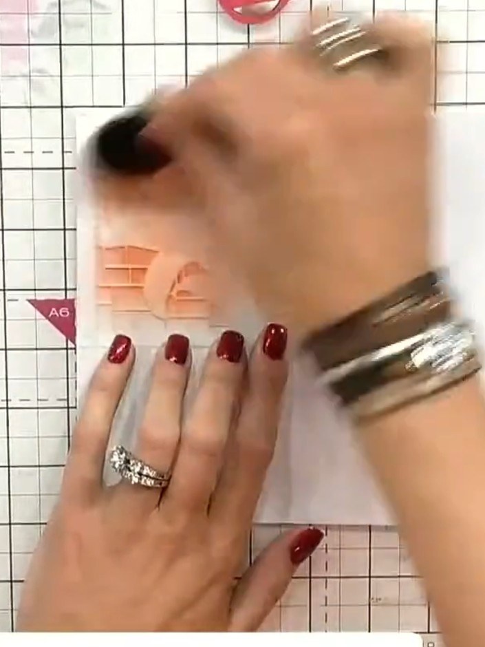 Step 4: Remove stencil one from the card and set it aside. Allow the red ink to dry completely before proceeding to th