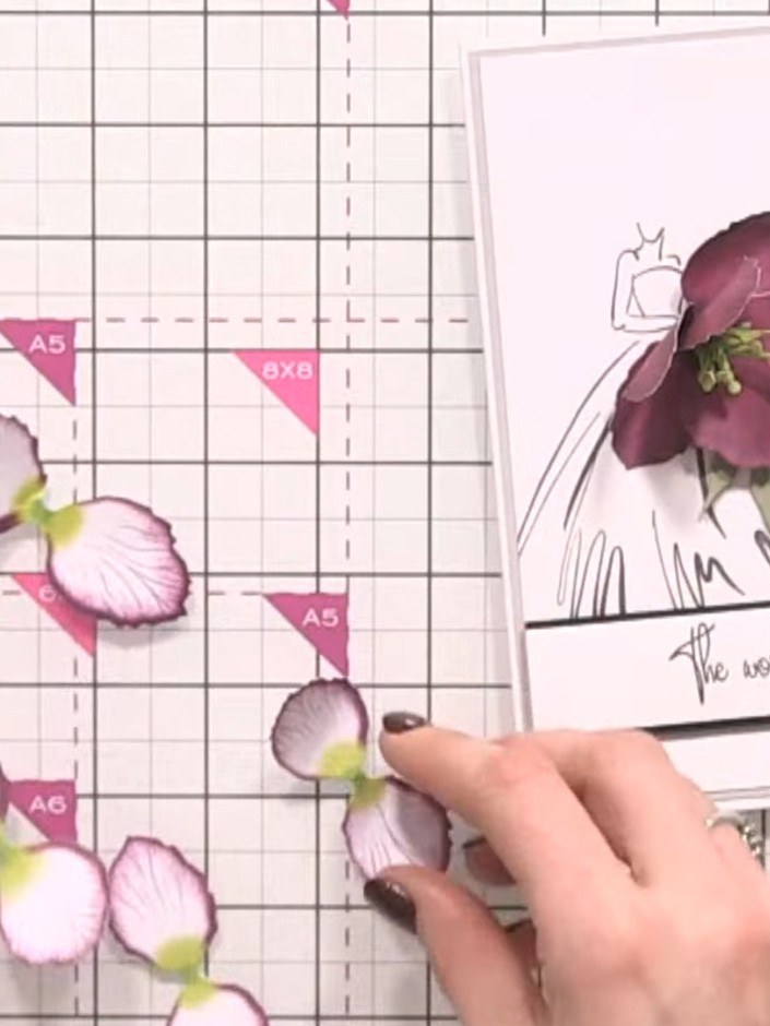 Step 7: Die-cut the small floral flower pieces from coloured cardstock using the hellebore die set. Ensure all the pet