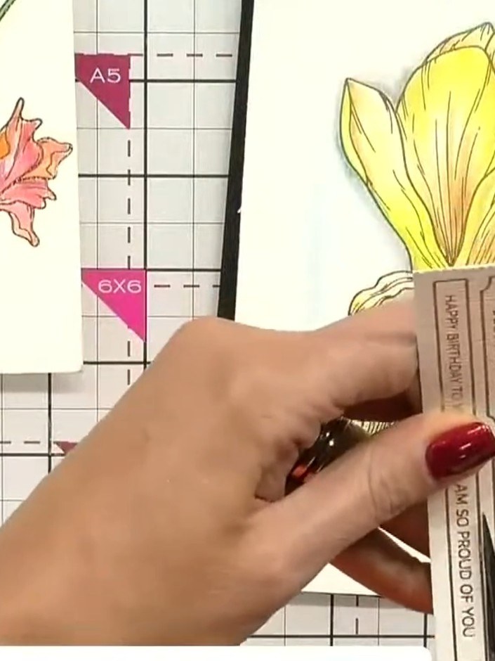 Step 3: Select a sentiment sticker from your sheet that coordinates with your watercolour floral image. Choose phrases