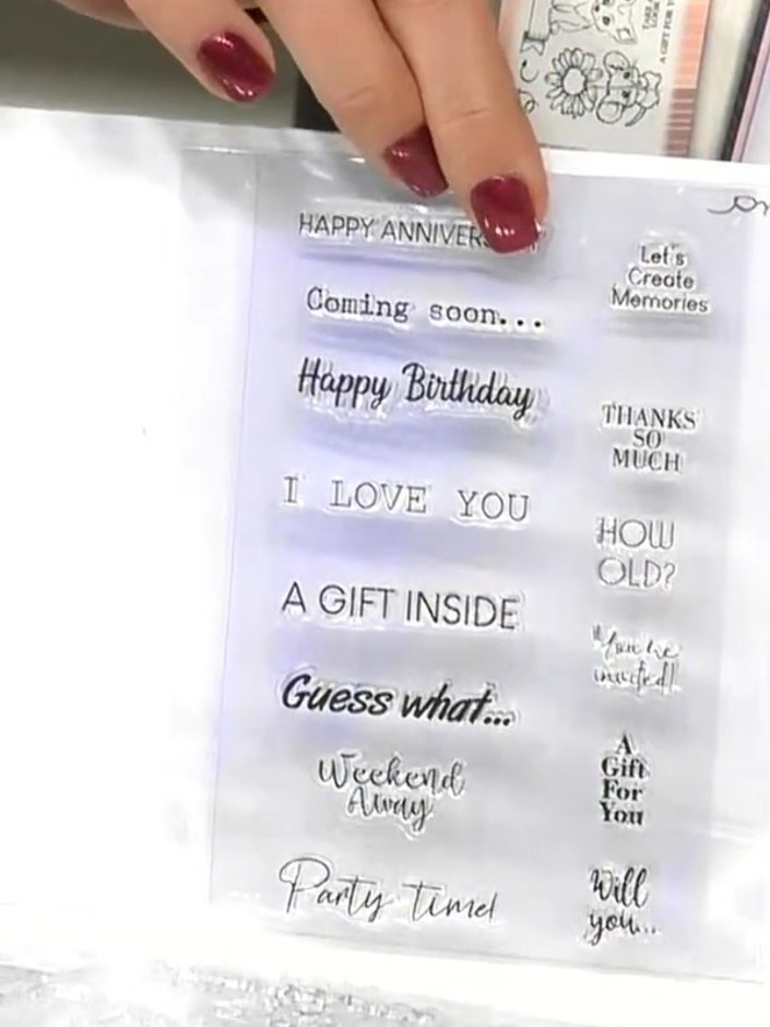 Step 6: Press the scratch-off sticker down firmly over the sentiment to secure it in place. Ensure there are no air bu