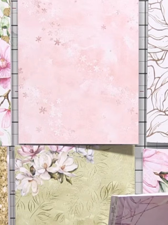 Step 2: Select six coordinating toppers from the kit featuring different floral and bird designs in pink, green, and g
