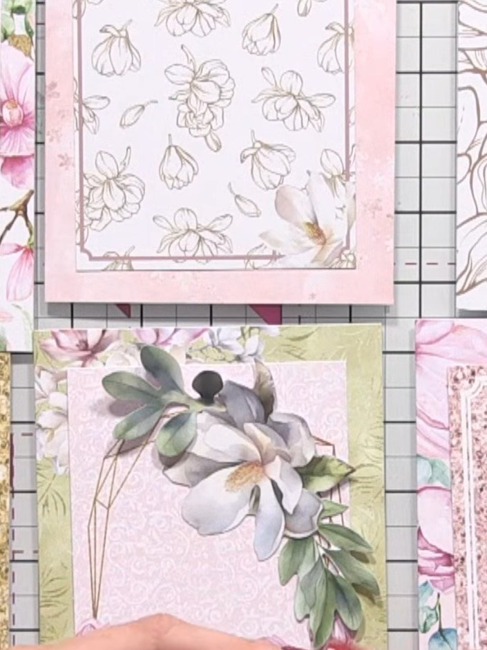 Step 6: Add dimensional elements by layering pieces to create depth. Position a bird embellishment amongst the flowers