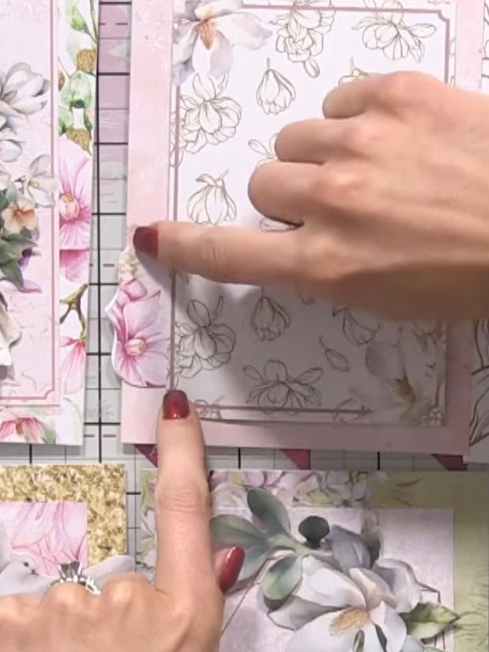 Step 9: For variation, fold a tag in half lengthways and position it on your card to create a shaped element within th