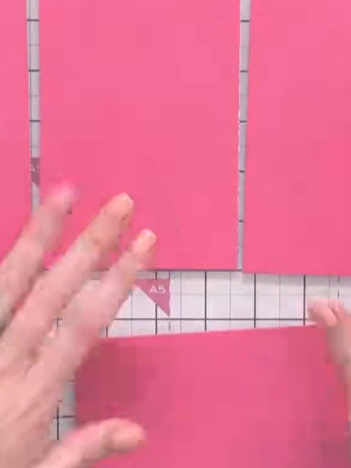 Step 3: Select patterned papers from your paper pad and cut them slightly smaller than your mat and layer pieces to cr