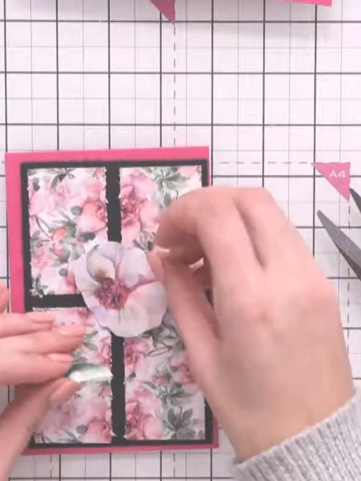 Step 4: Fussy cut individual flowers and leaves from the floral patterned paper using small scissors. Cut carefully ar