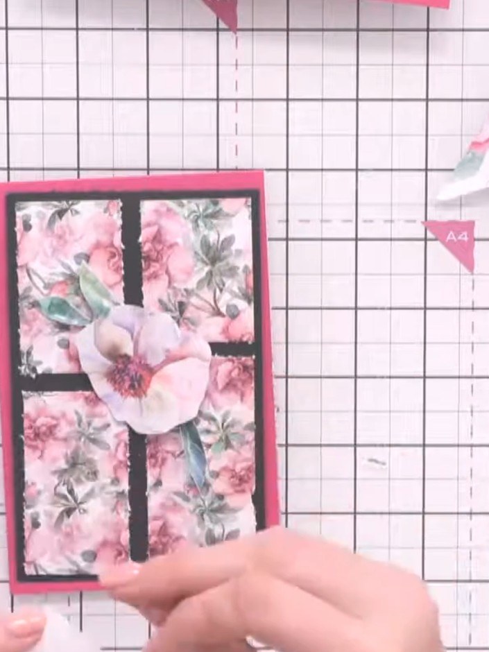 Step 5: Layer your fussy-cut flowers and leaves onto the card front using foam pads or glue dots for dimension. Positi