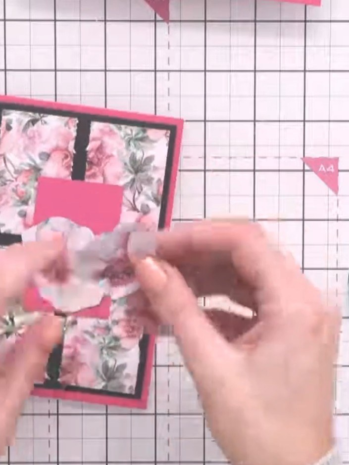 Step 6: Arrange your fussy-cut floral elements on the card to create a balanced cluster. Layer the flowers from back t