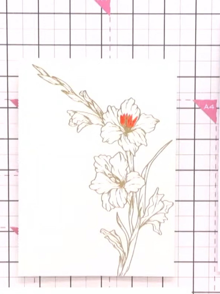 Step 2: Using watercolour brush pens, colour in the floral design on the foiled card. Work on one flower at a time, ad