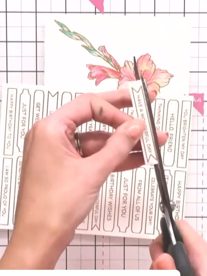 Step 2: Use scissors to carefully cut around the shape of the sentiment tag, following the simple outlines provided on