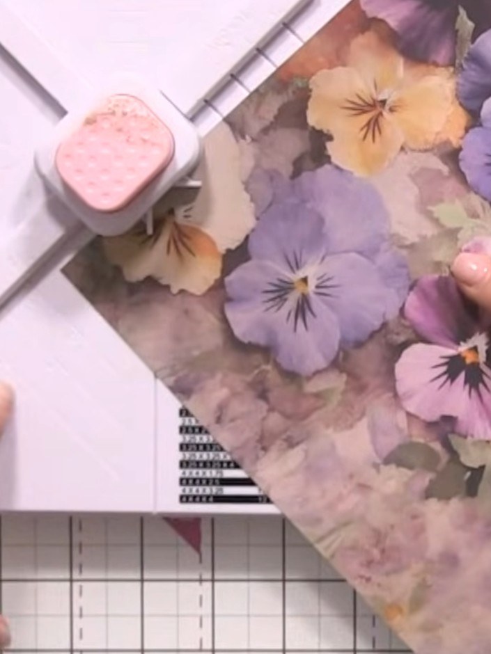 Step 1: Place your 12 x 12 inch cardstock into the Box and Envelope Maker, lining it up at the XL marking on the board
