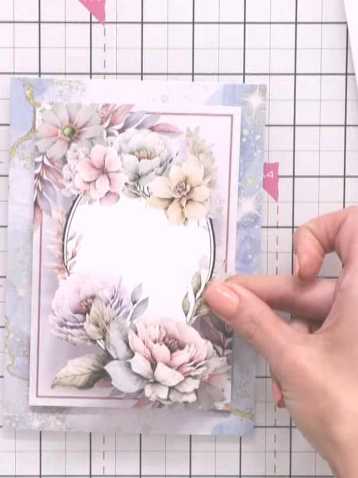 Step 3: Attach foam pads to the back of your floral topper to add dimension. Position the raised topper onto your card