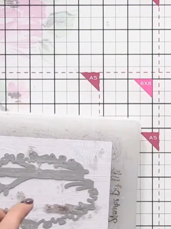Step 2: Place your card with the die on top, sandwich between cutting plates, and run through your die-cutting machine