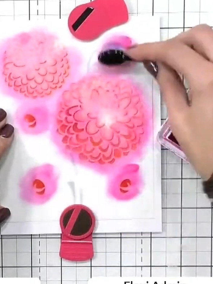 Step 7: Apply the sixth stencil layer using a darker teal ink to add the final punch of colour and depth to the floral