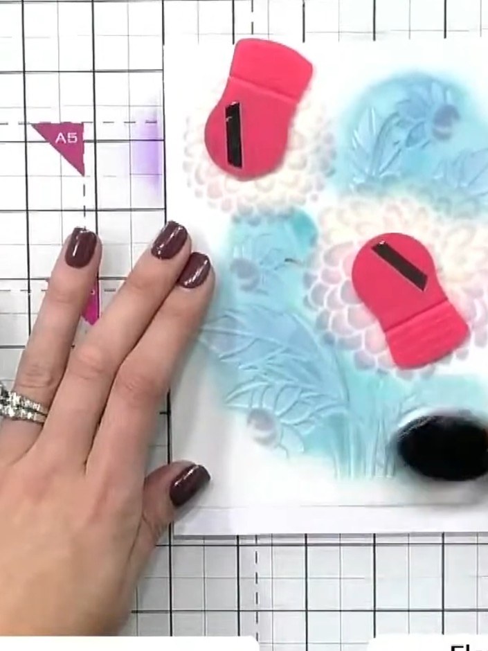Step 8: Apply sparkle paste or embossing medium through the final stencil layer using a blending tool or sponge for ad