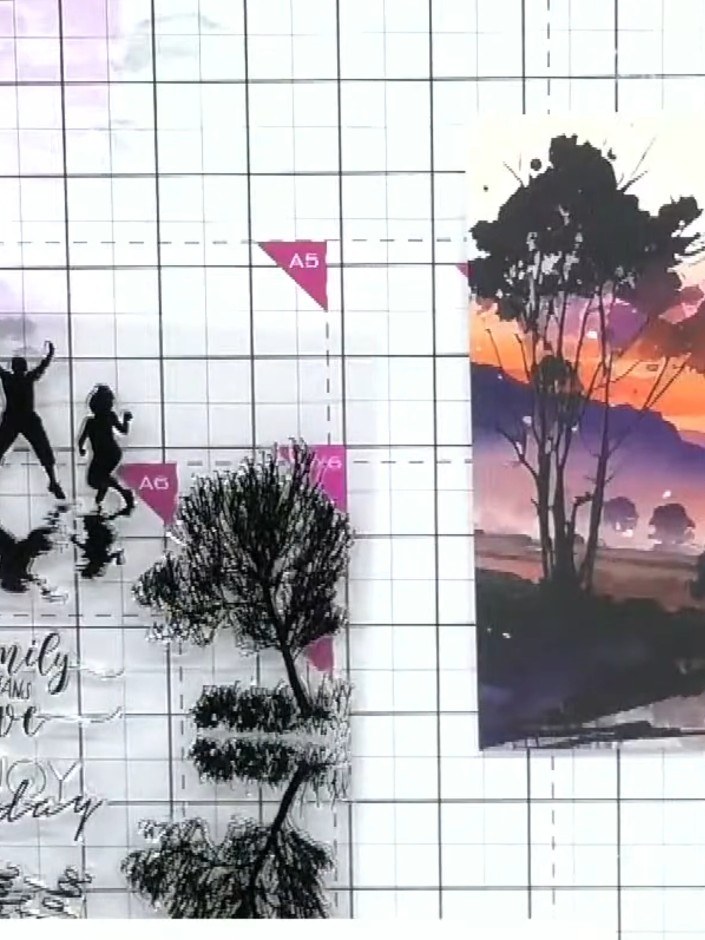 Step 1: Select a patterned paper from the Reflection Collection to use as your base layer. The example shows a sunset 