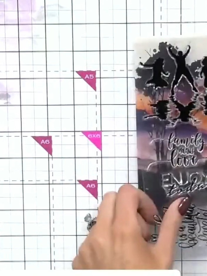 Step 2: Position the silhouette people stamp on the sunset background, testing different placements to find the best p