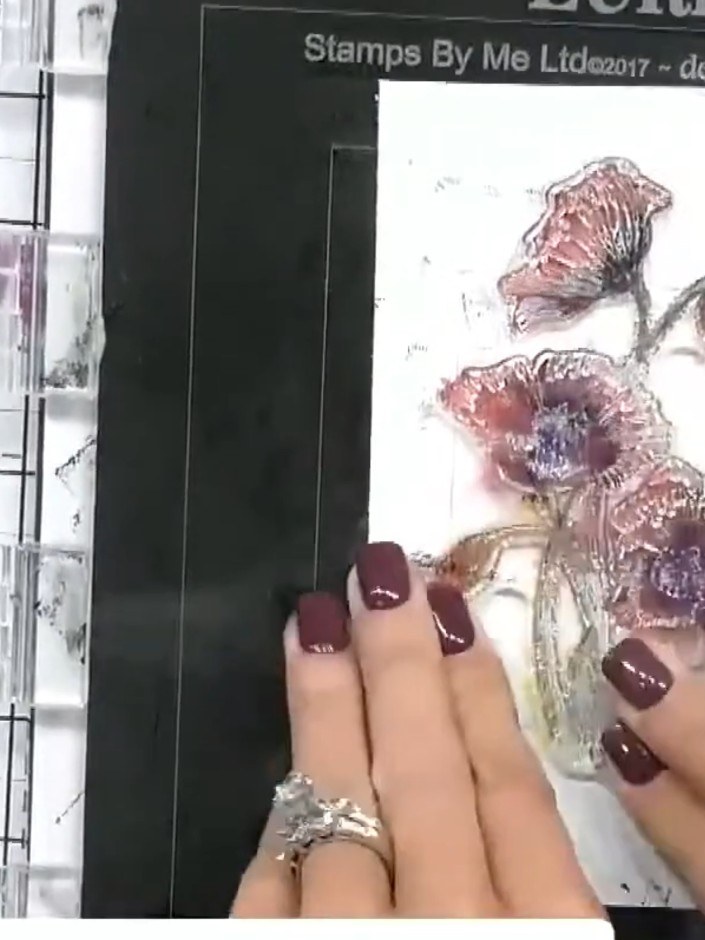 Step 9: Sprinkle gold embossing powder over the stamped floral image, ensuring all the wet ink is covered. Tap off the