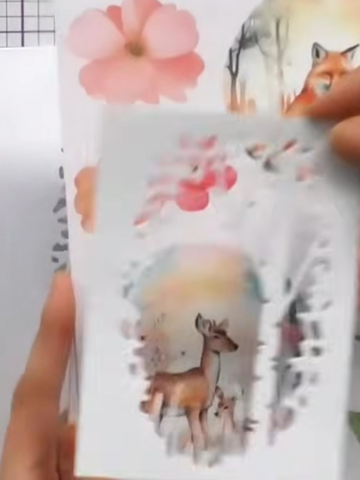 Step 5: Fussy cut embellishments from the You Are So Lovely embellishment pack. Select animals such as the fox or deer