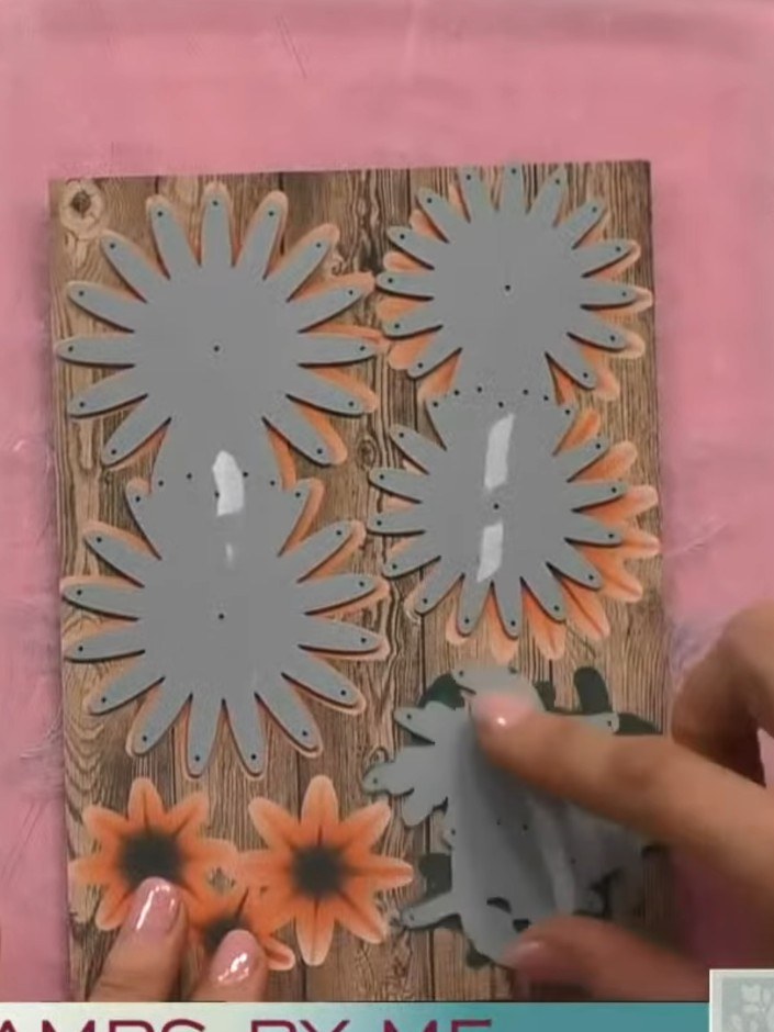 Step 4: Pop out the cut flower pieces from the die-cut card using a pokey tool. Carefully remove the grey chrysanthemu