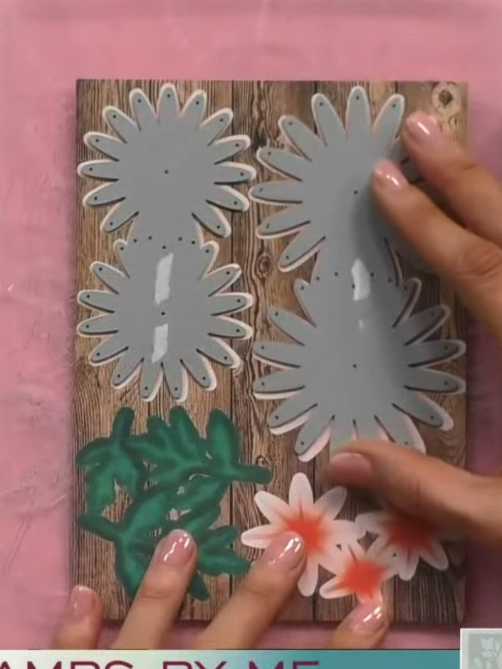 Step 5: Select die-cut chrysanthemum pieces in different sizes. Layer them together on your card, choosing either the 