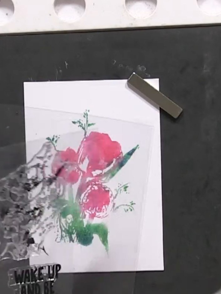 Step 7: Allow the stamped card to dry completely before proceeding. The watercolour effect from the lamination stampin