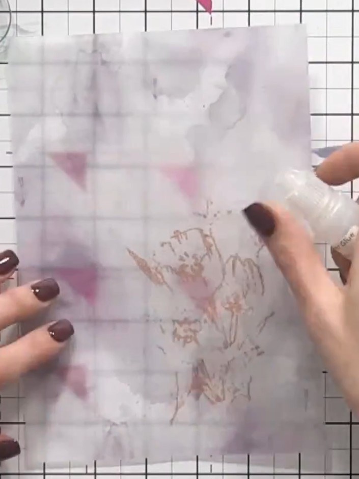 Step 4: Press the vellum sheet down firmly onto the front of the card base, smoothing it from the centre outwards to e