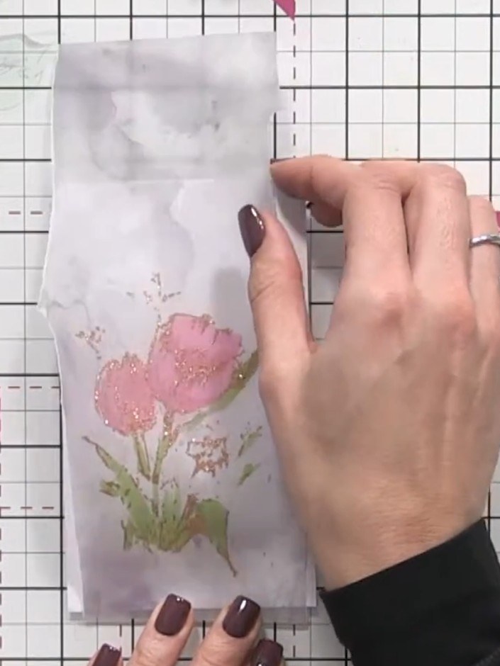 Step 6: Mount the decorated vellum onto a white or contrasting card base using a tape runner or small glue dots. Posit