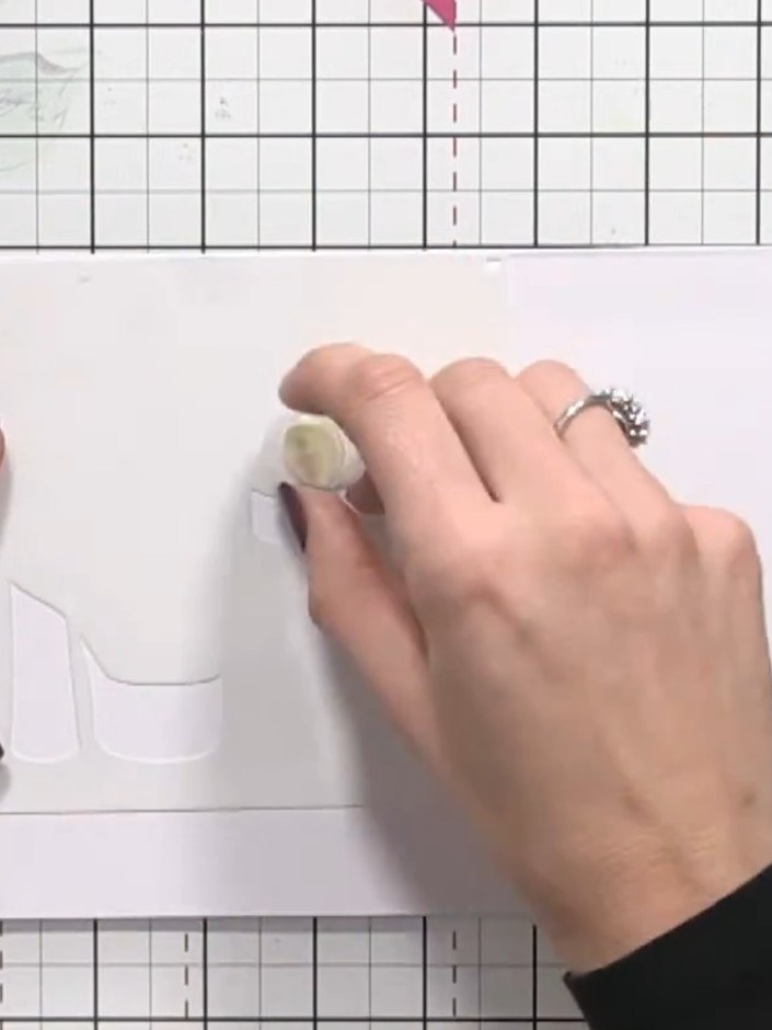 Step 2: Position stencil number one on your card base and align it using the four heart registration marks in the corn
