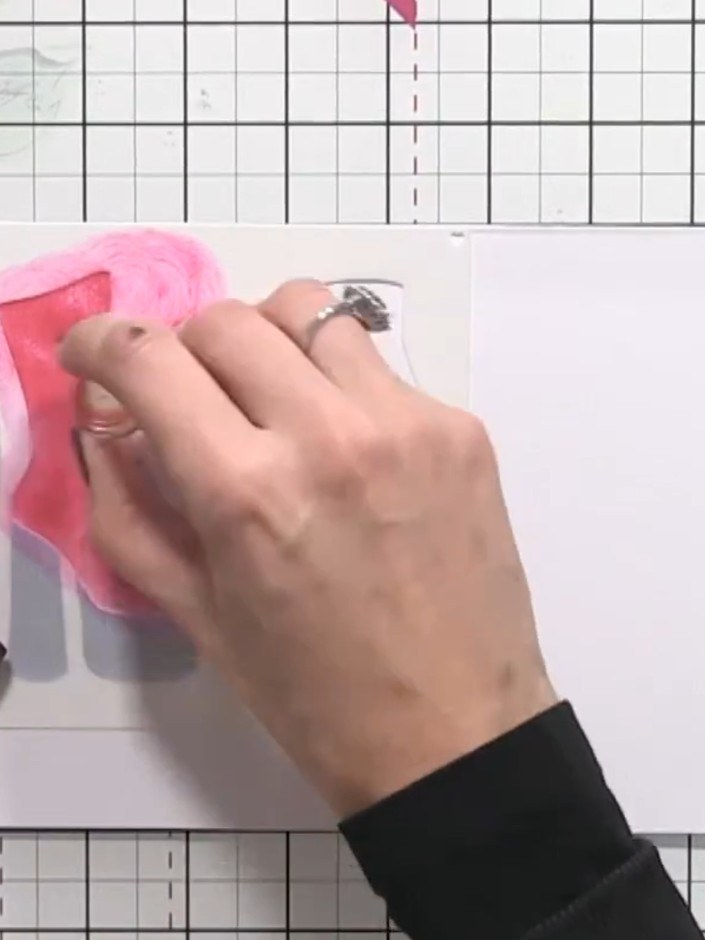 Step 6: Place stencil number three over the shoe design and apply the same pink ink using a blending tool to maintain 