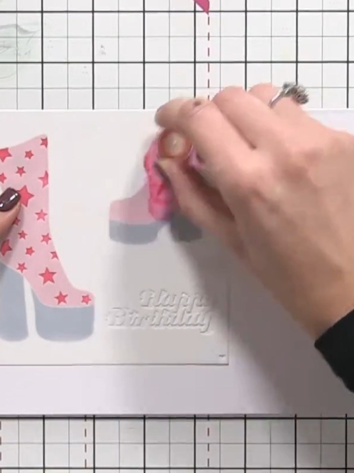 Step 8: Stamp 'Happy Birthday' or your chosen sentiment onto the card below the shoes using the word stamp from the co