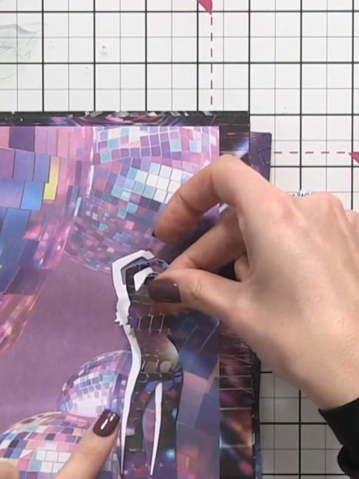 Step 3: Position one of the silhouette figures onto your card base. Adhere it in place using glue or double-sided tape