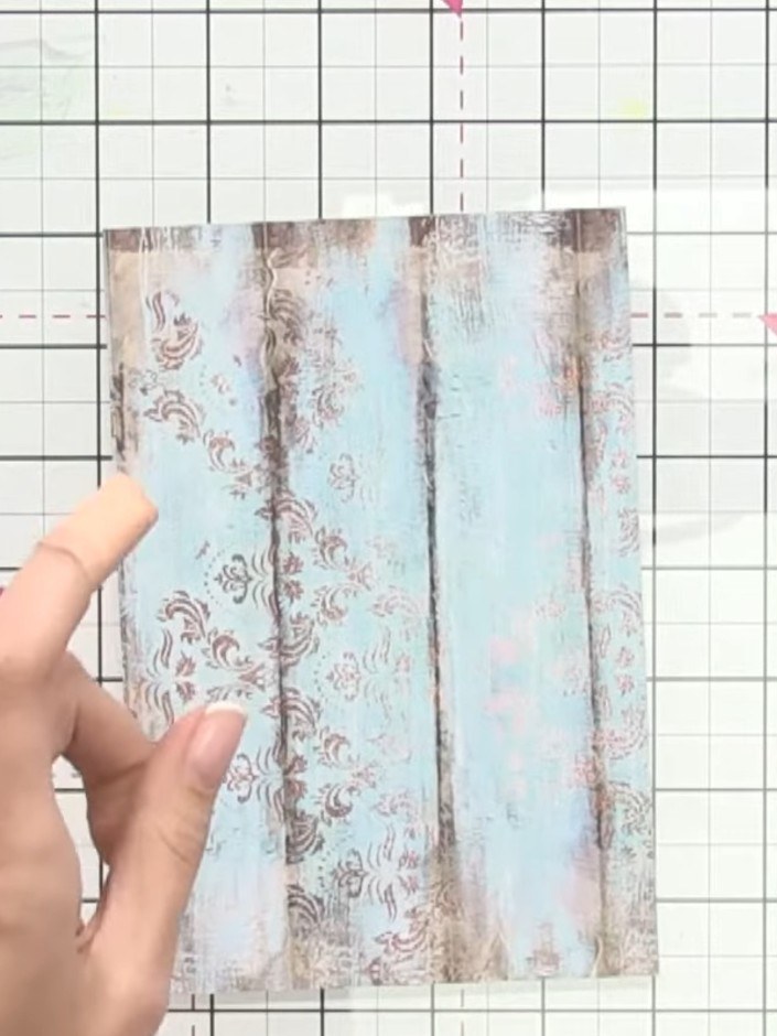 Step 2: Trim your decorative paper card base to your preferred size. You can create a rectangle shape rather than keep
