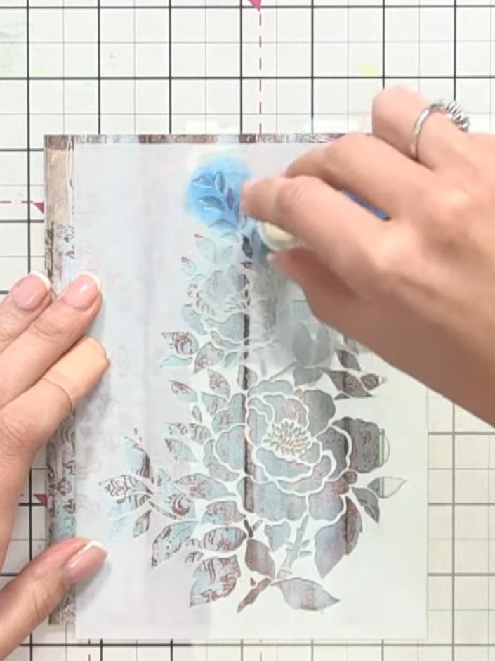Step 4: Using a sponge dauber, lightly apply teal ink to the leaves of your stencil. Build up the colour gradually to 