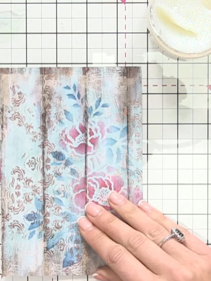 Step 8: Apply sparkle paste generously through the stencil using your finger or a spatula, ensuring all areas of the f