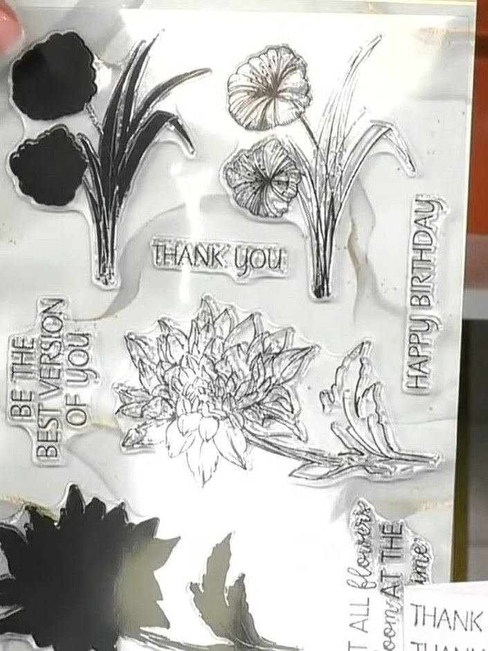 Step 2: Ink the solid flower and leaf stamps with your chosen colour using an ink pad. The solid stamps create the bas