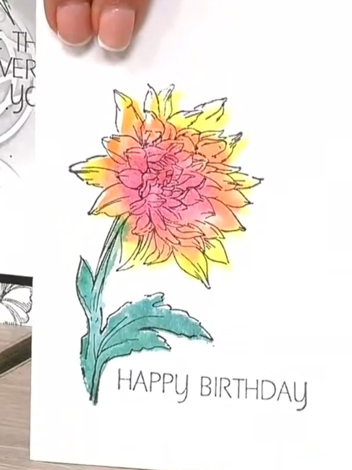 Step 5: Ink the outline portion of the stamp with a contrasting colour. Use black or a dark shade to create definition