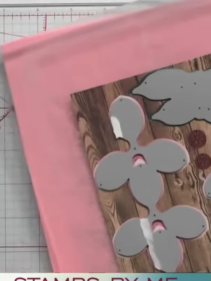 Step 7: Glue the grey petals together using dry clear glue to build up the flower shape. Layer the petals on top of ea