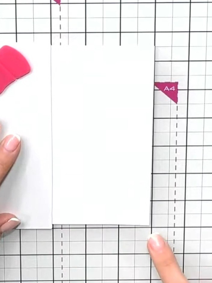 Step 2: Use a ruler or straight edge to mask off a horizontal line across your white card where the background will en