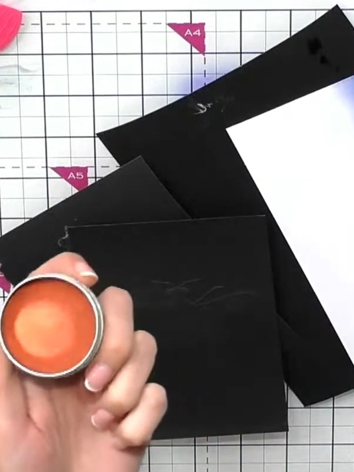 Step 6: Optional: Apply gilding wax to the embossed areas using your finger to highlight the raised texture. This adds