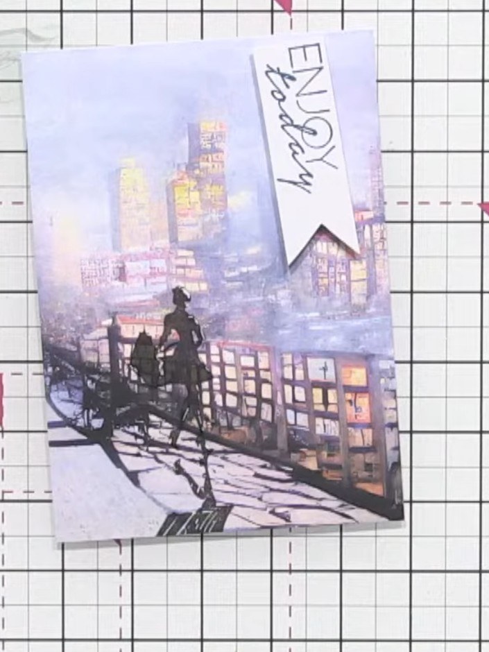 Step 9: Position the 'ENJOY today' sentiment stamp at the top corner of your finished panel. The completed card featur