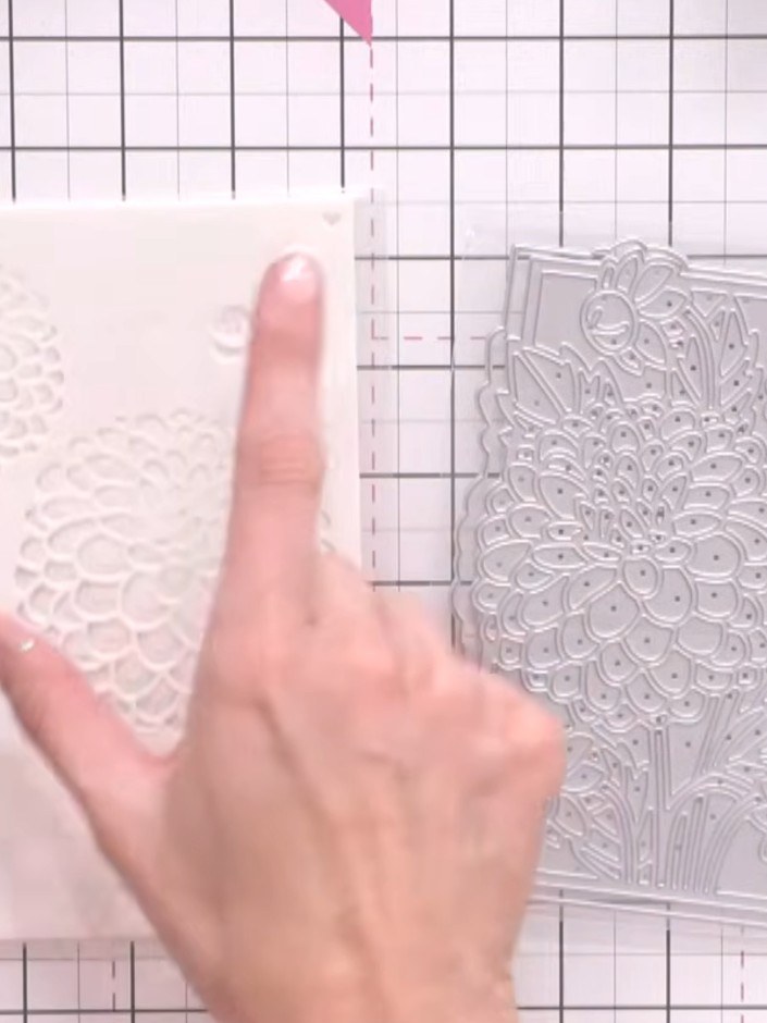 Step 3: Continue building up the floral design by repeating the stenciling process with layers two, three, four, and f