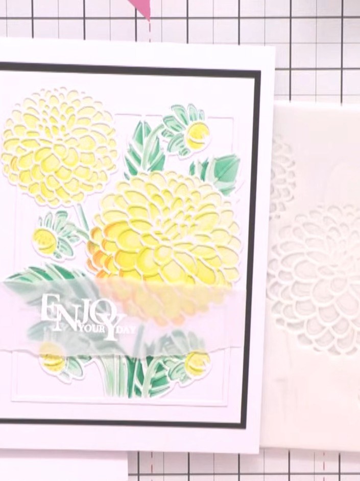 Step 7: Mount your finished stencilled floral panel onto a white card base with a black border frame. Position the pan