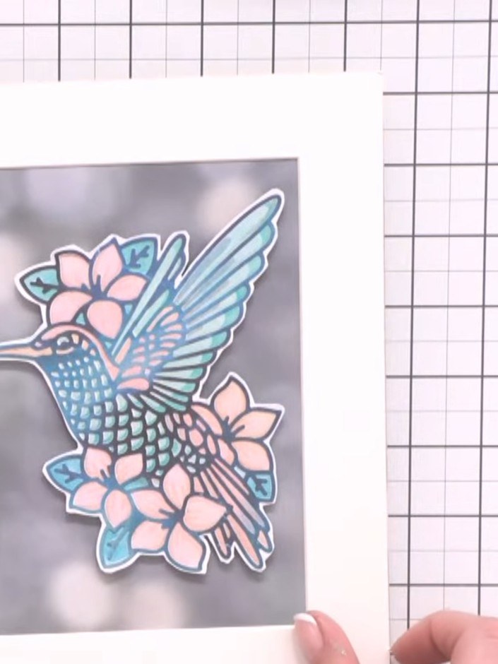 Step 2: Place the first stencil layer over your card base, aligning it using the heart guides. Apply your chosen ink c