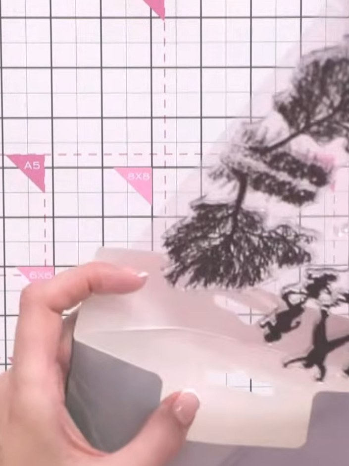 Step 4: Use grey or a lighter shade of your chosen colour to stamp the reflection portion of the design below the main