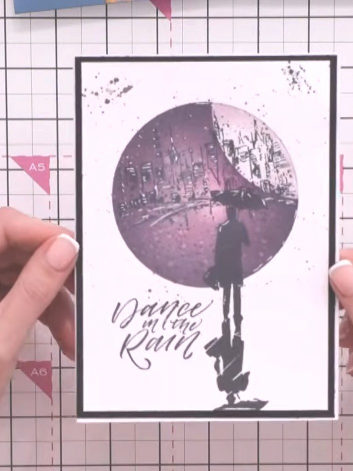 Step 6: Add sparkle and rain effects to your card using a white gel pen to create small dots and drizzle marks around 