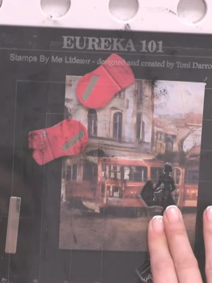 Step 5: Carefully lift the stamp away from the card to reveal the stamped image. The partial silhouette effect should 
