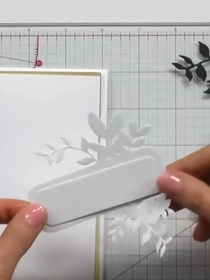 Step 7: Stamp a design onto the white circle centre piece using white ink for an elegant tone-on-tone effect. The whit