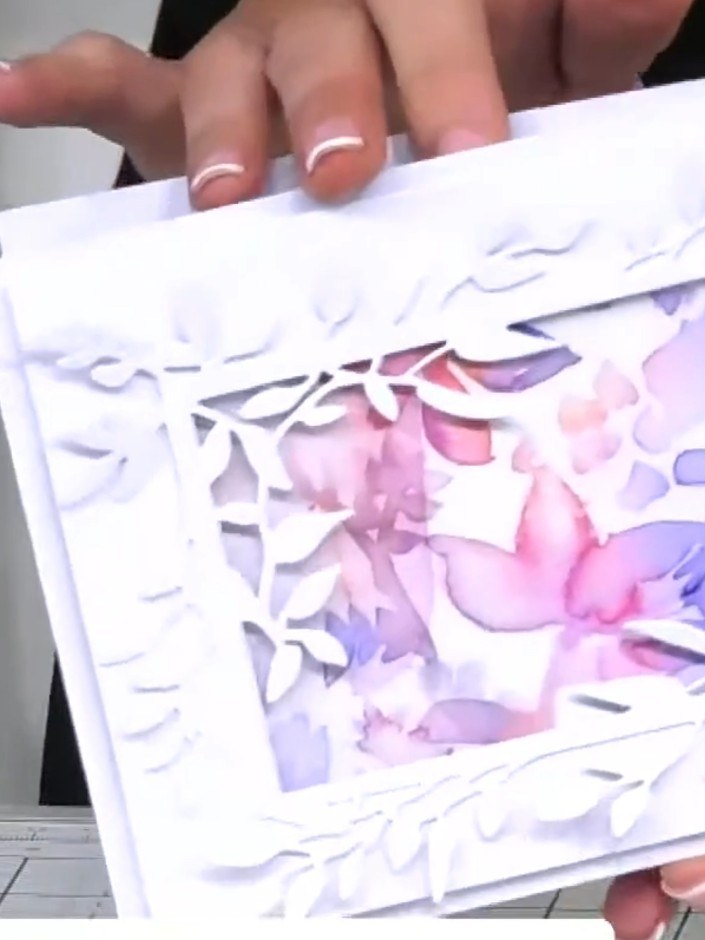 Step 8: Add dimension to your card by attaching some foliage elements with foam pads to create 3D layering. Leave some